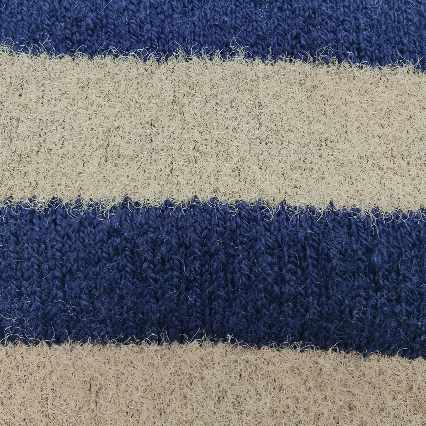 Close-up texture detail of Laetts Women’s Heavy+ Outdoor Socks in cream and navy stripes, showing the plush Merino wool knit enhanced with HygroHeat™ thermal technology for maximum warmth.