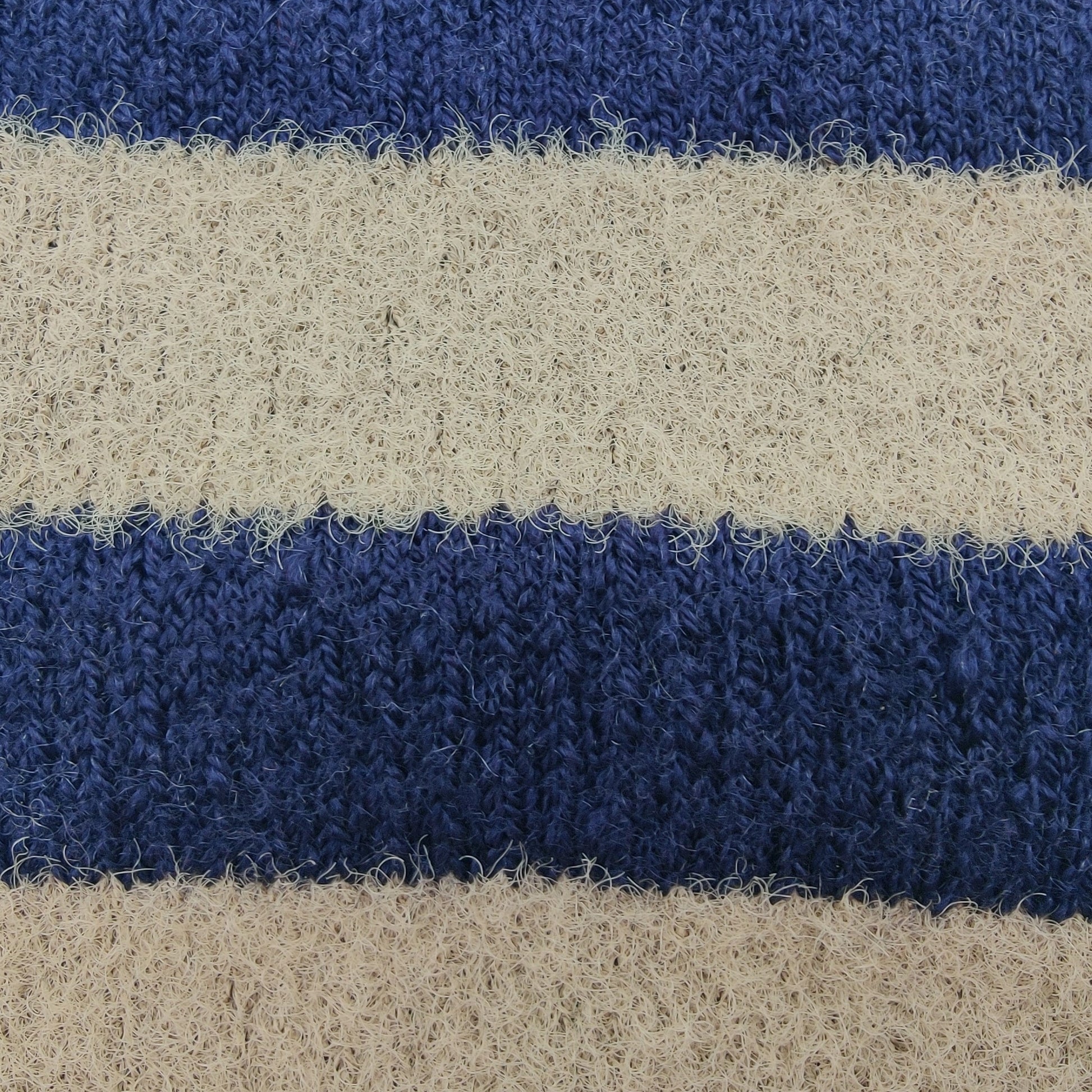 Close-up texture detail of Laetts Women’s Heavy+ Outdoor Socks in cream and navy stripes, showing the plush Merino wool knit enhanced with HygroHeat™ thermal technology for maximum warmth.