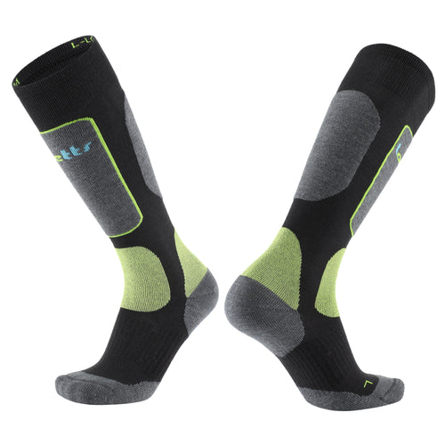 Laetts women’s Light Snowboard BootGlide™ socks in black with gray panels and green BootGlide™ low-friction zones. Over-the-calf (OTC) design featuring patented BootGlide™ and HygroHeat™ technologies with Merino wool for warmth, comfort, and easier boot entry.