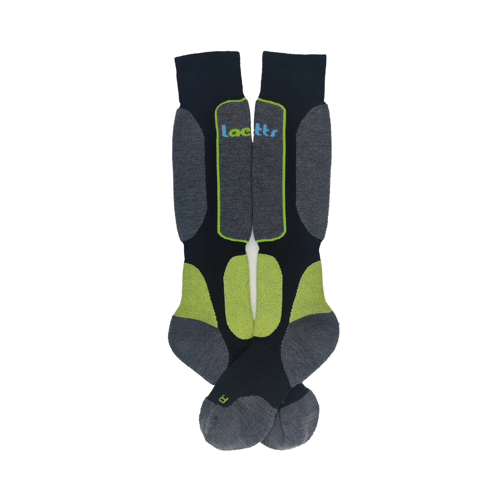 Flat lay of Laetts women’s Light Snowboard BootGlide™ socks in black, gray, and bright green. The over-the-calf socks feature patented BootGlide™ low-friction zones highlighted in green, gray reinforced heel and toe panels, and the Laetts logo at the cuff. Designed with Merino wool and HygroHeat™ for warmth and comfort.