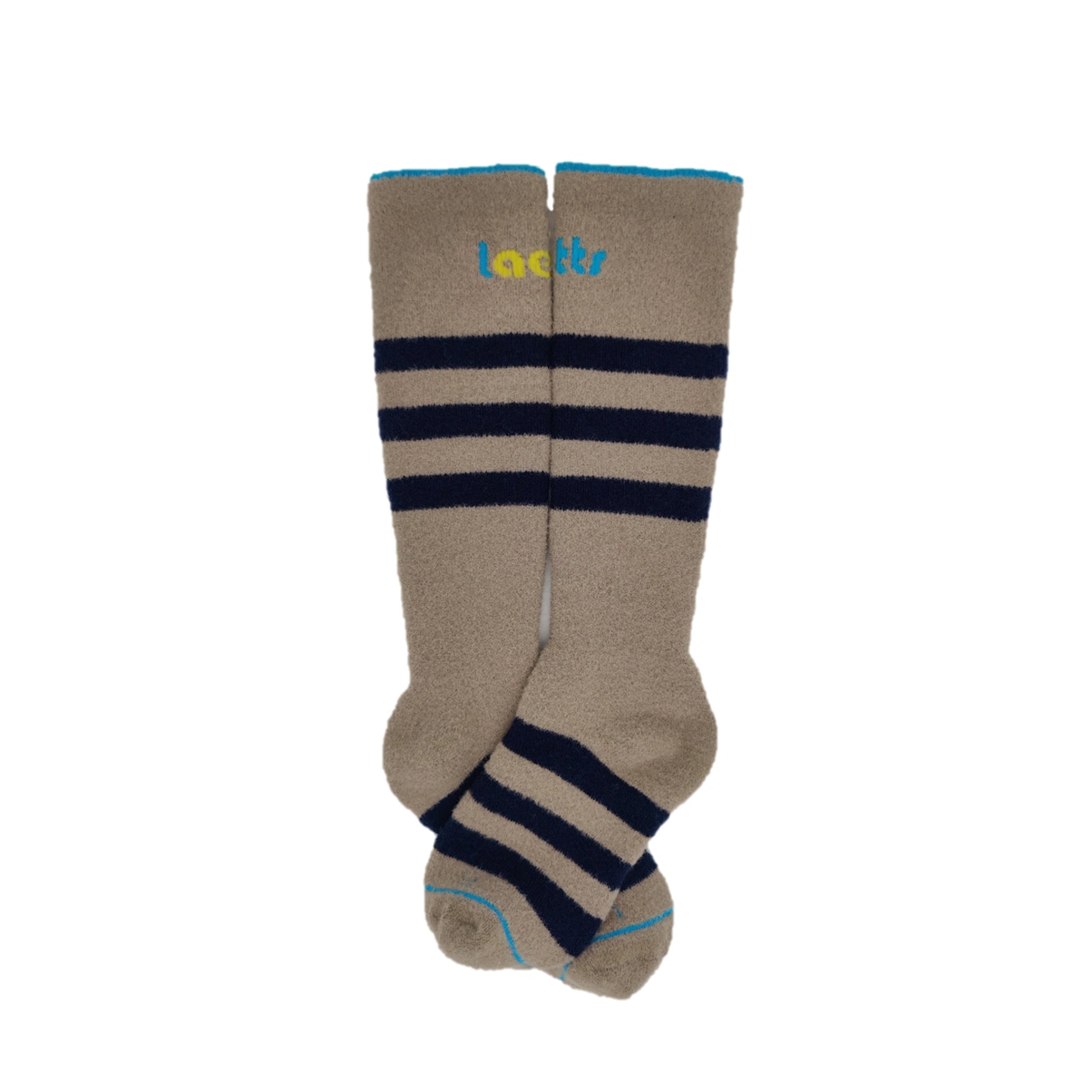 Laetts Women’s Heavy+ Outdoor Socks laid flat, cream with navy stripes, over-the-calf design featuring Merino wool blend and HygroHeat™ patented thermal technology — the warmest socks in the Laetts line.